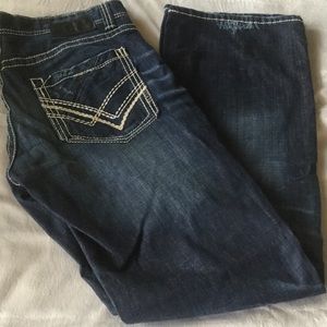Men’s Buckle dark denim jeans.